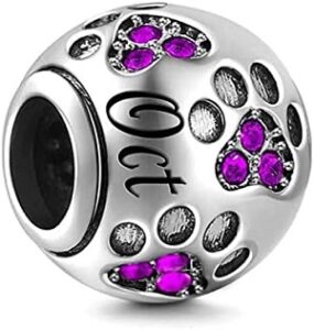 abalorio redondo con huellas de perro y circonitas